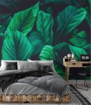 Fototapeta green leaves on dark background 