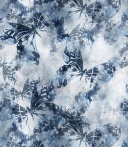 Próbka tapety motyle na tle indygo