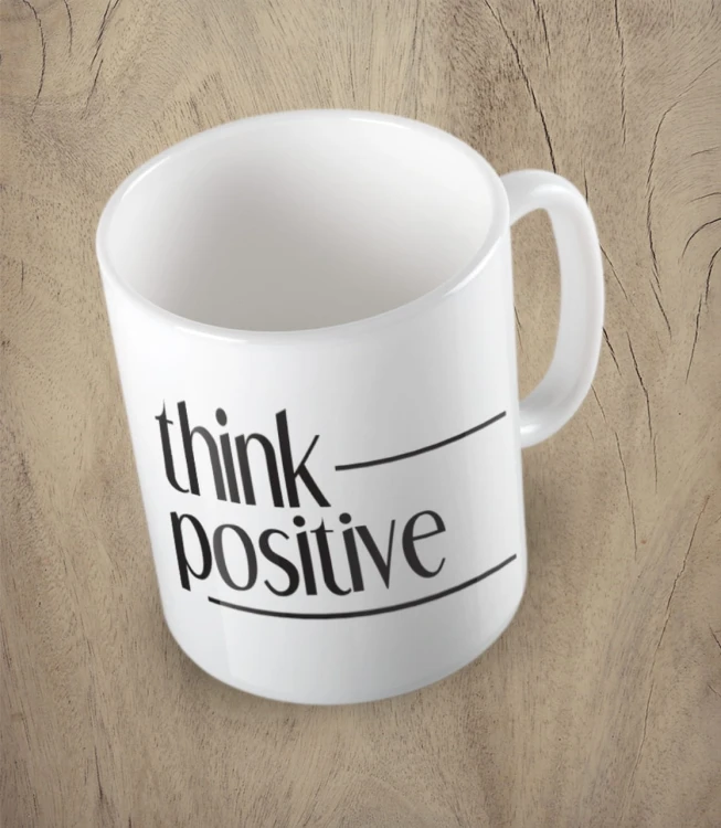 Biały kubek think positive