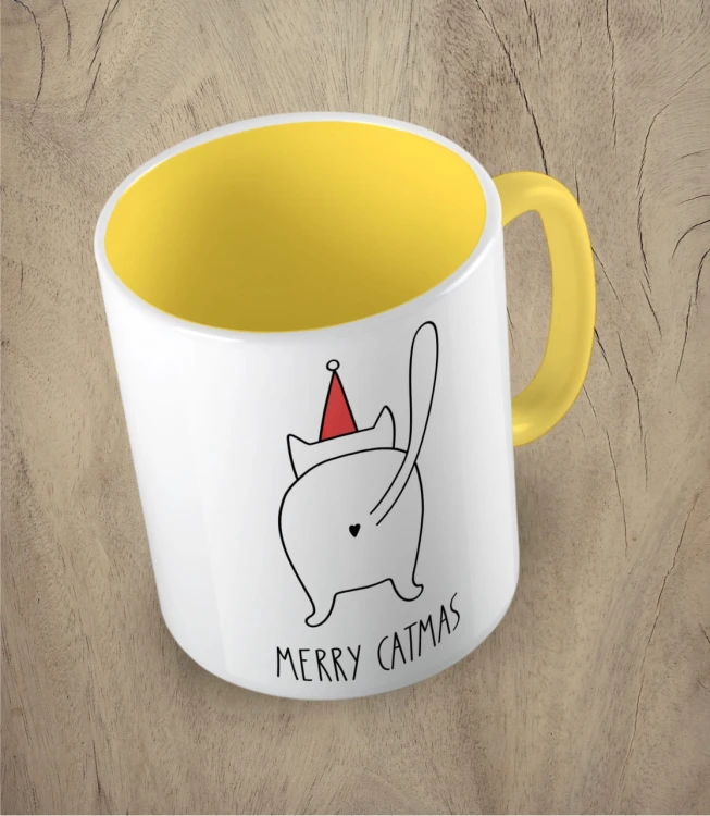 Żółty kubek merry catmas