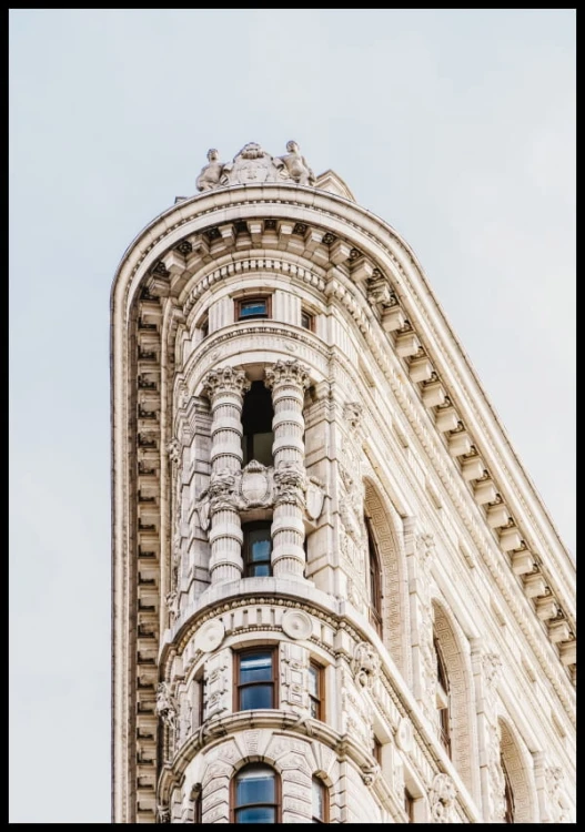 Plakat ze zdjęciem zabytkowego budynku Flatiron Building, który ozdabia Manhattan w Nowym Jorku