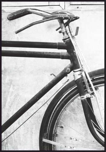 Plakat zabytkowy rower w odcieniach szarości, fotografia roweru w dawnym stylu