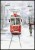 Rysunkowy plakat dziecięcy i młodzieżowy przedstawiający ulicę w zaśnieżonym miasteczku