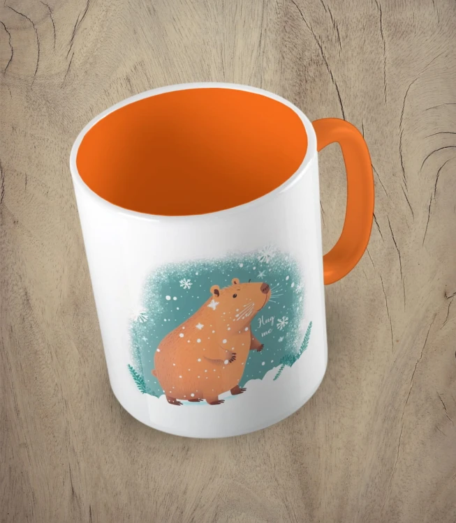 Poamarańczowy kubek snowy capibara