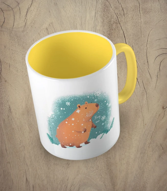 Żółty kubek snowy capibara