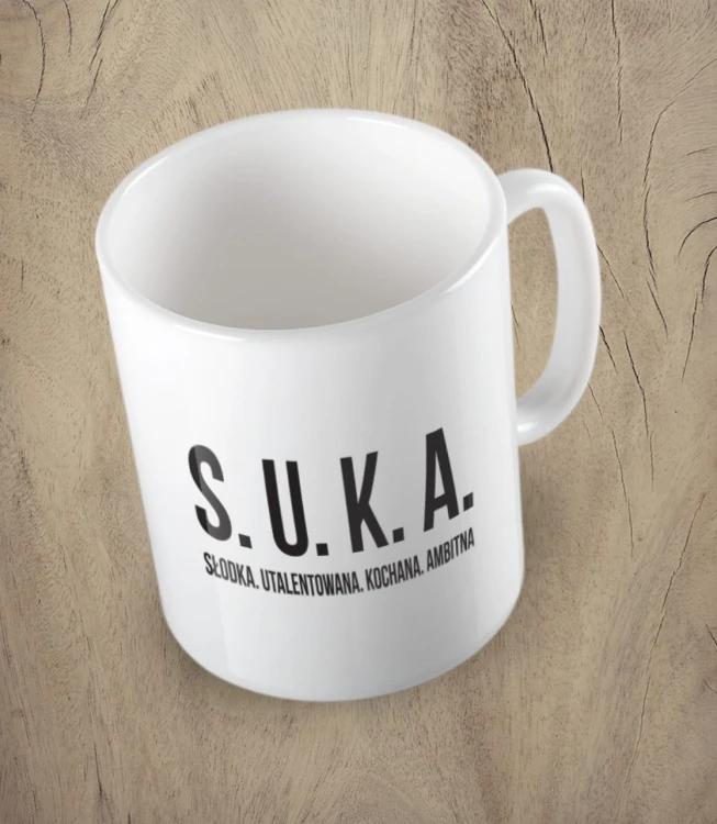 Biały kubek suka